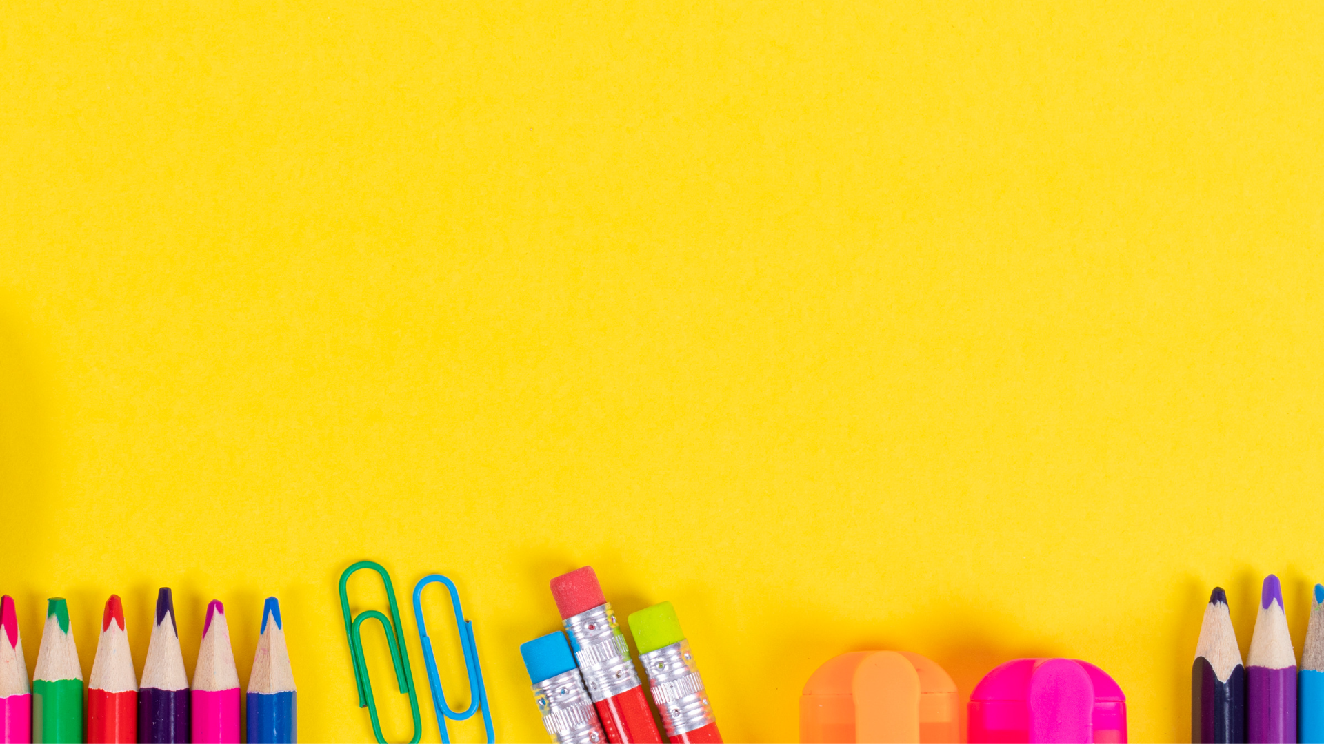Back to school supplies, coloured pencils and paper clips.